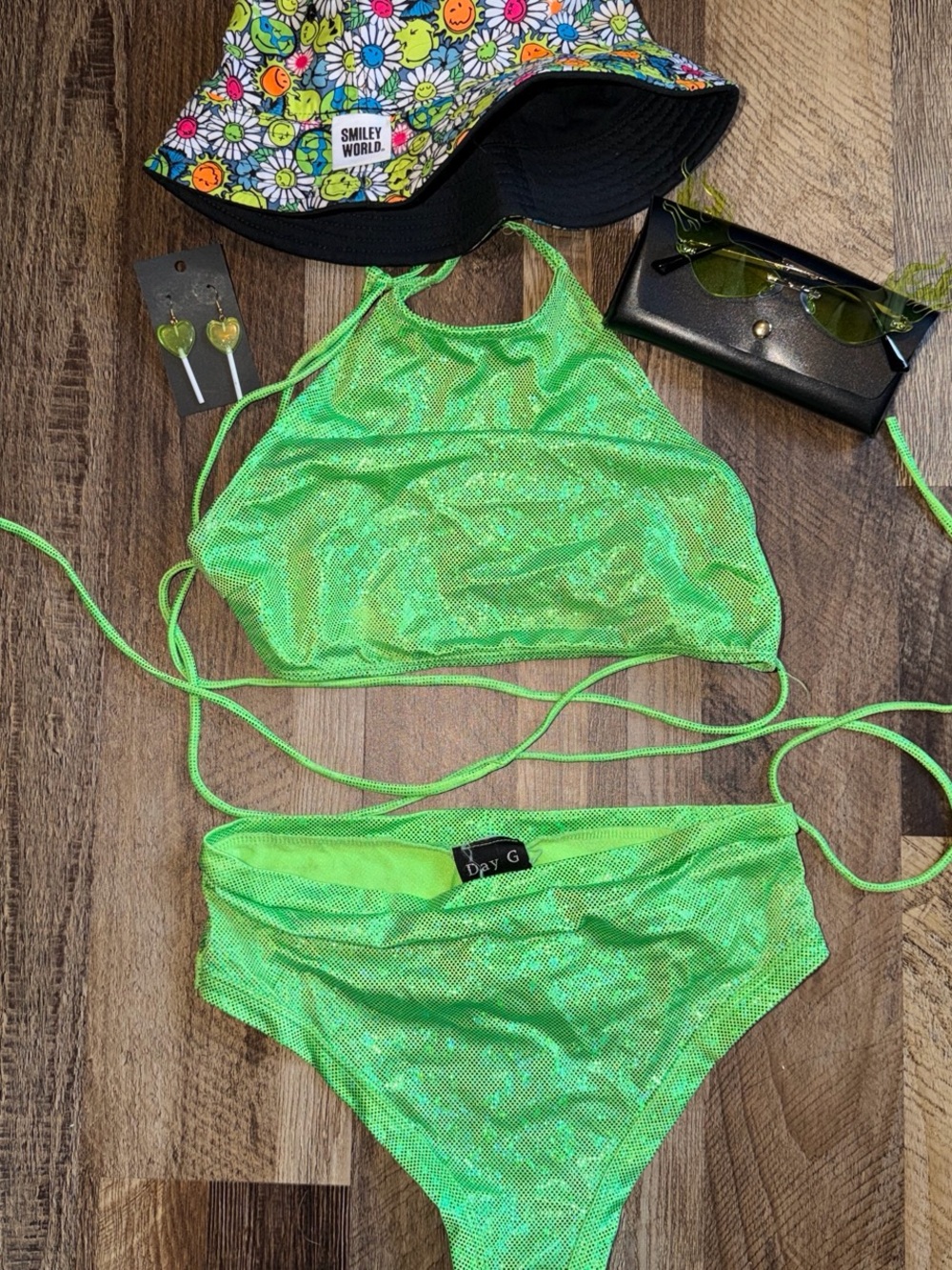 Day G Neon Green Shimmer Two-Piece Bikini Set with earrings and sunglasses